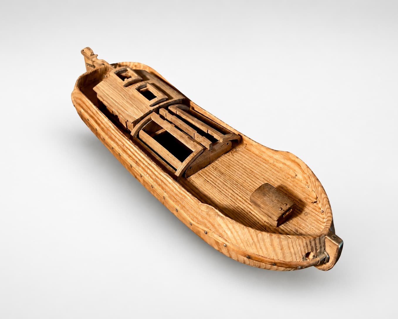 The bare hull seen from above, deck structures taking shape and the interior still open